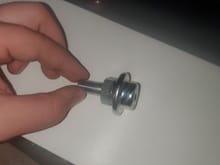This is the part from O'Reilly's and it does not have the screw in the middle. But they and auto zone said this is the part I need and it has a semi part number match.