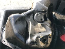Dented oil pan (it was leaking too) - WTF!!