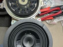 Comparing the OEM "sub" with the RF 8" I'm installing.