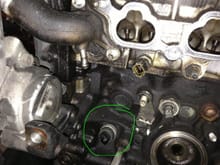 I cannot for the life of me figure out what this sensor is any help is appreciated. Its on the intake side right behind the power steering pump