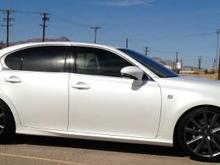 Custom lowering springs installed with stock F Sport wheels.