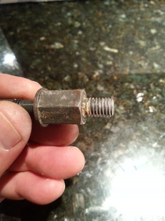 The original threaded hex bolt standoff is corroded....resistance/voltage drop to block....Could it me cleaned..possibly, but the protective coating is toast and well worth replacing for a few dollars