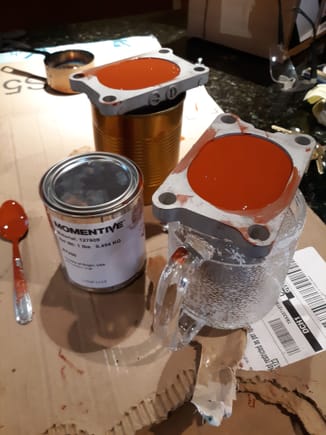 Purchased one pound of  Momentive Material #127809, two-part silicone potting compound from McMaster-Carr Supply.

Back-filled the engine bracket with encapsulating compound, then set the preformed Lead  into the mount and covered it over. Shimmed the holding receptacles for level fill.