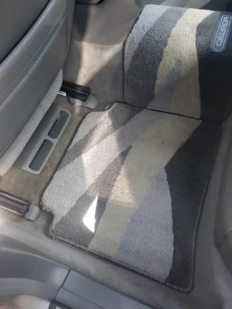 Celsior three-mat set installed. Toyota used a continuous organic pattern. Velcro strips hold mat pattern in alignment. Excellent quality.. Over twice as heavy as the OEM mats.