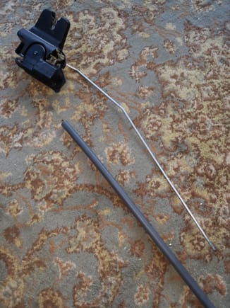 Trunk latch/solenoid assembly depicting keylock rod. Marine grade 3:1 heatshrink tubing with internal adhesive depicted.

