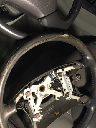 Original steering wheel was just as nasty replaced with a newer model.