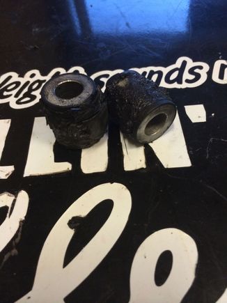 Pulled the rack bushings out last night....Think the picture says it all! My battle version aluminum bushings will be here this week. I cant wait!