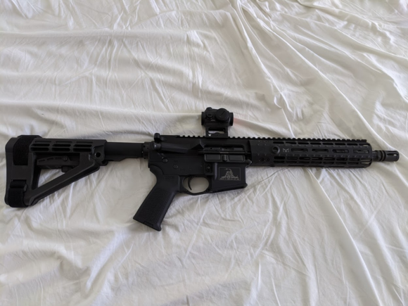 I built this AR pistol last year.   It's a PSA lower + lower parts kit with an SBA4 brace.    Upper & barrel came from Aero Precision.  Barrel length is 10.5".    Topped off with a Vortex Crossfire II red dot.    It's a fun little plinker.