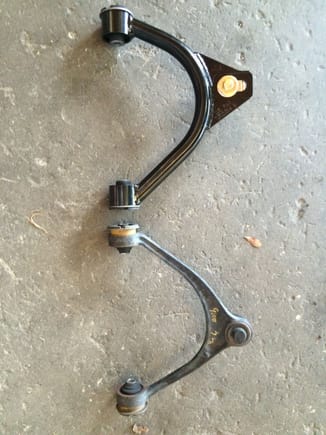 The new and old upper control arms