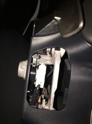 there are 3 pins securing the airbag. 1 at the bottom, and one on each side of the steering wheel.