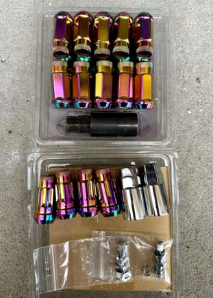 Neochrome lug nuts included with wheel locks. Also, two new valve stems from Work.