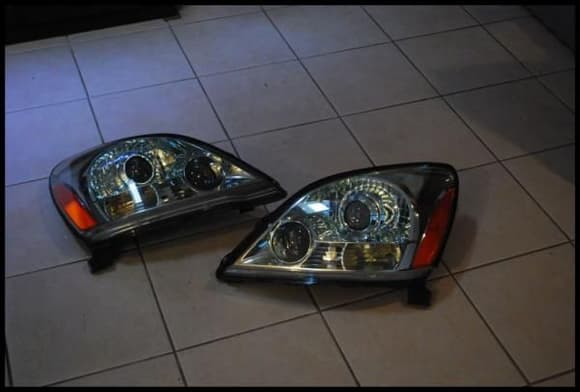 Stock head lights?

Nope, they have SC430 HID projectors in them w/ color modded Honda S2K lenses and white painted shields to match the Blizzard Pearl pain.