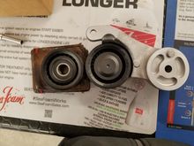 Might be hard to see in the picture but the idler pulley definitely has an bigger outside diameter