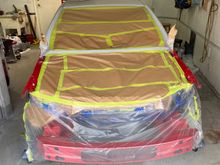 Masking done to keep the dust out of car as I final sand the body