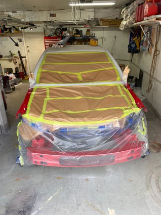 Masking done to keep the dust out of car as I final sand the body