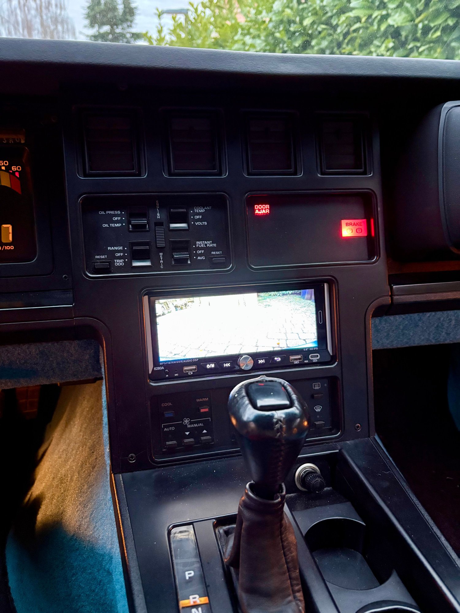 1.5 din 6.9 inch , cost nothing, you can even have a backup camera and digital radio. And you get CarPlay/android auto
