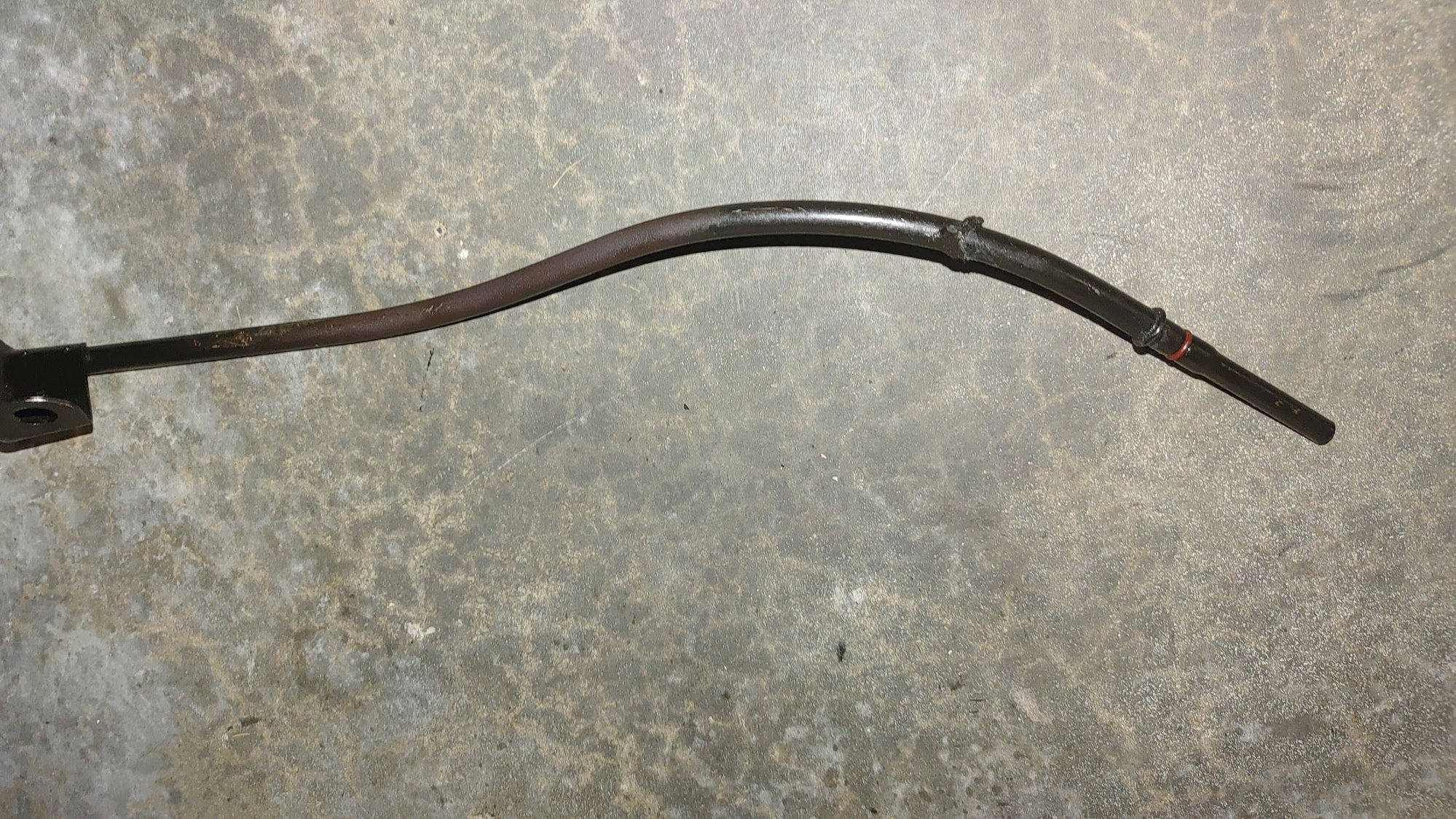 2002 base c5 wire wrapped/melted around Oil dipstick tube