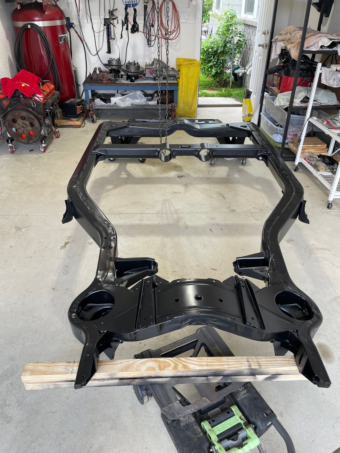 Frame after powder coating and Im ready to rock and roll.  Parts everywhere ready to go back on.