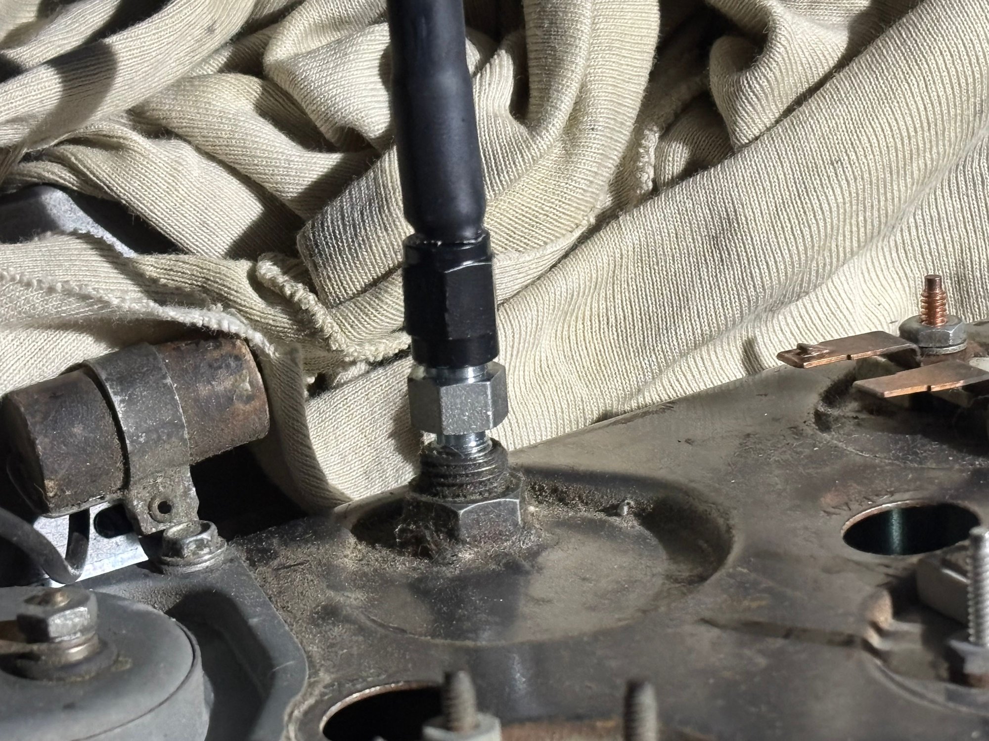 Straight, I�m very sure, will not work� but, I can test the concept.  No leaks with the engine running.   Elbow fitting on order.  