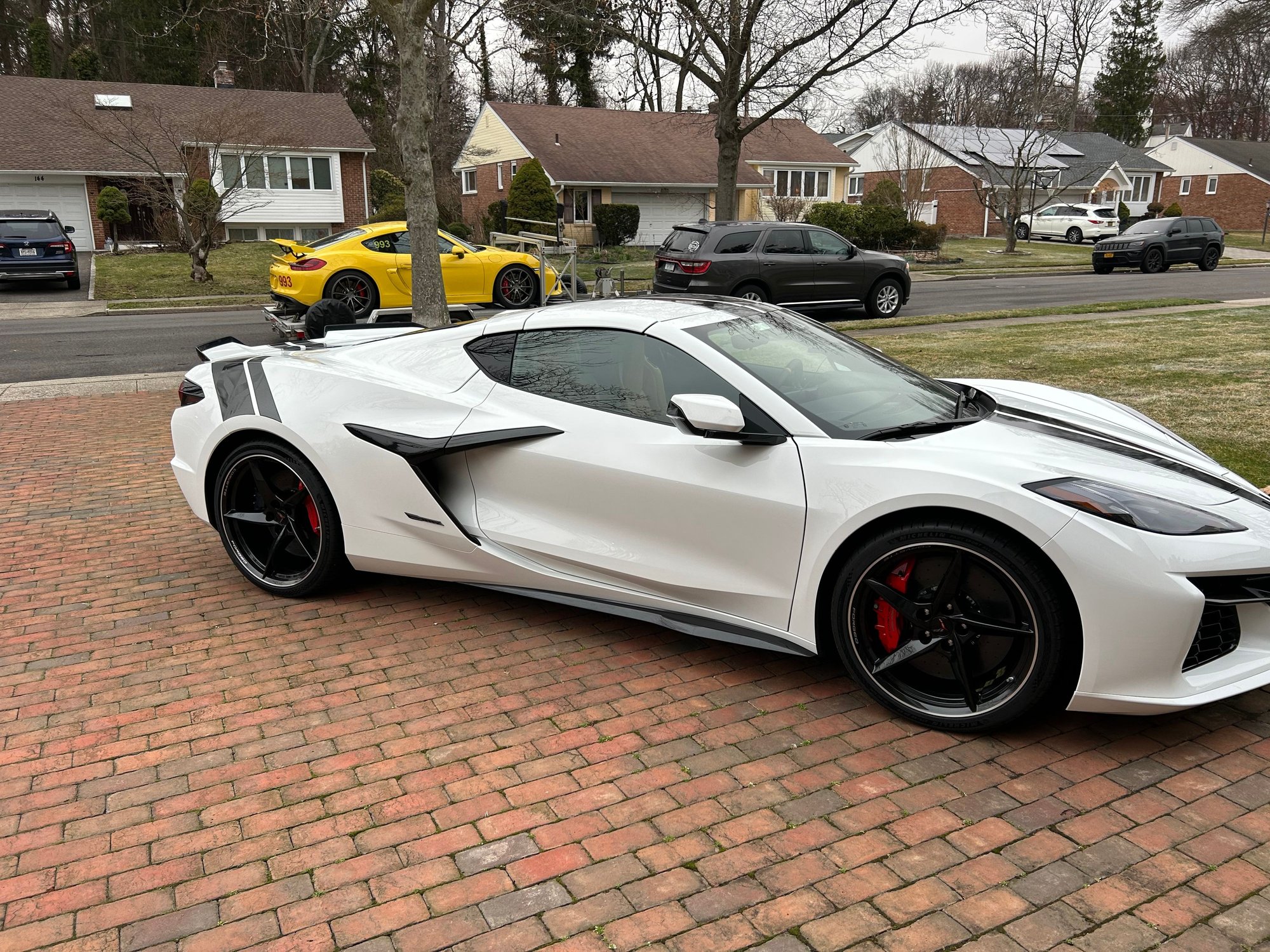 My first Corvette picked up a 2025 E-Ray in March, 4500 miles on her already. Love the Black/White combo. Only issue so far has been the door locking mechanism has failed and I need to open the window to reach outside the car to open the door !!! Ridiculous�.. but what a sweet ride !! Am I expecting too much from an American 🇺🇸 built car ?!?!
