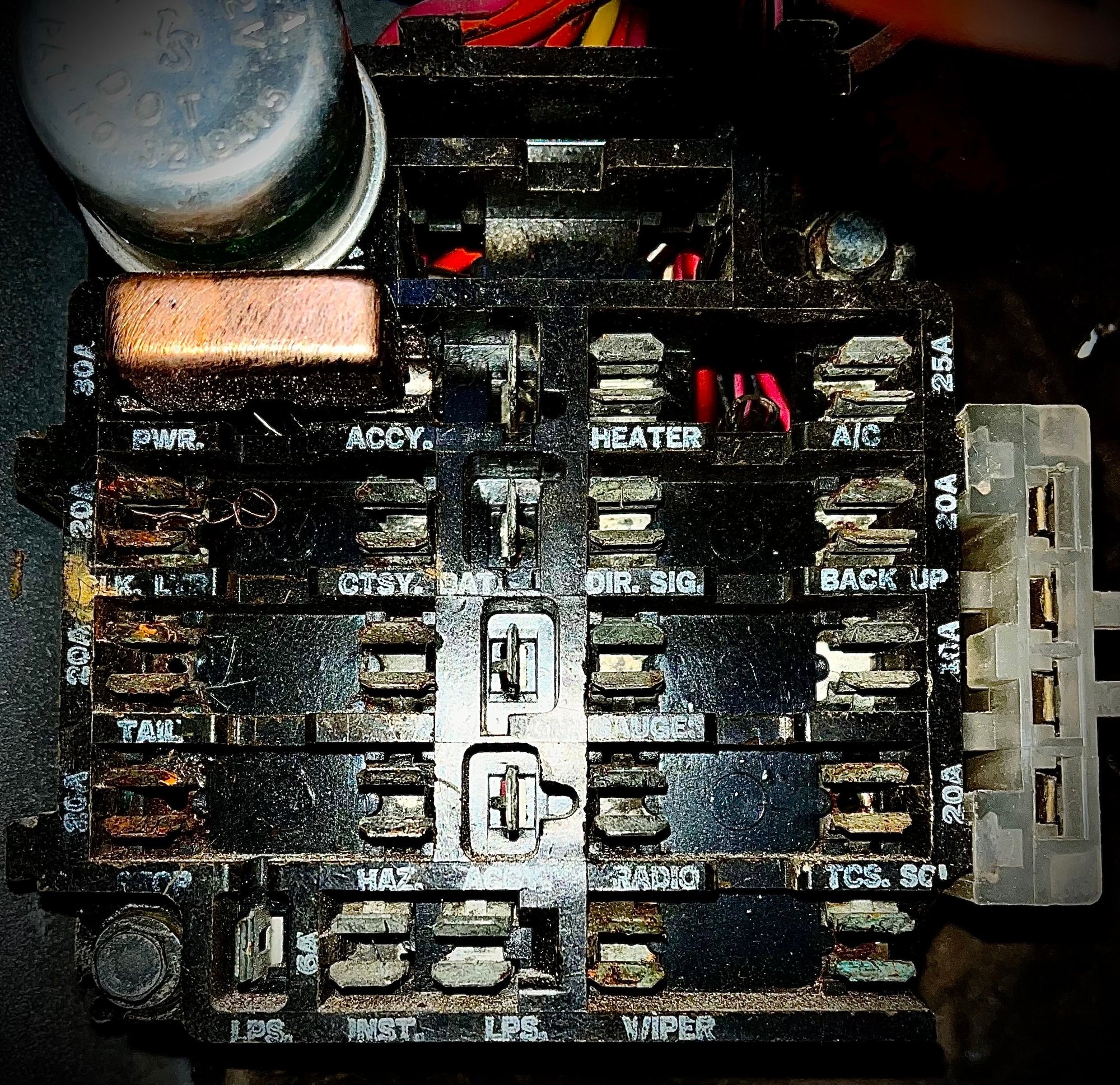 I�ll clean corrosion off of the contacts with a dremel tool & apply dielectric grease, then put in new fuses.