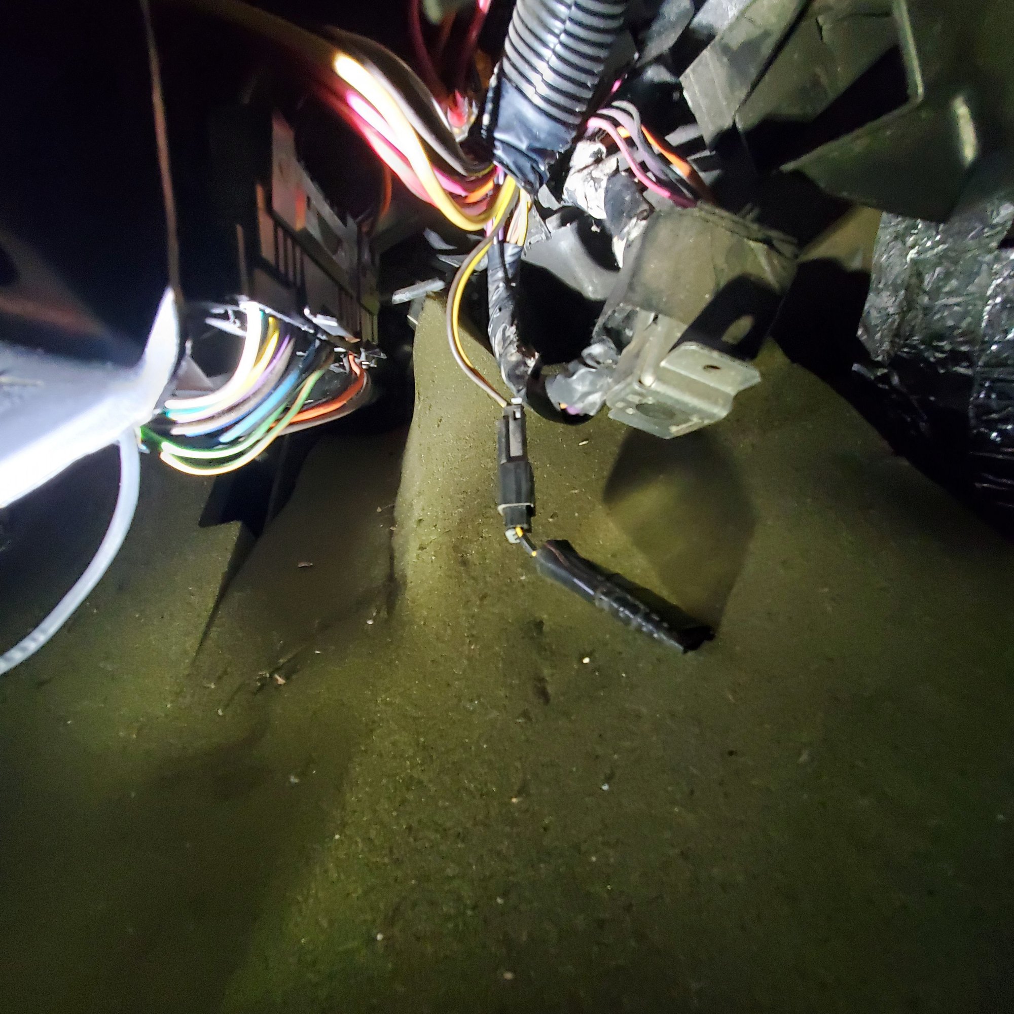 two prone female plug connection is wrapped in black tape I assume is VATS bypass resistor? Should that not be like that and the new ignition cylinder two prone male wire plug into that instead?