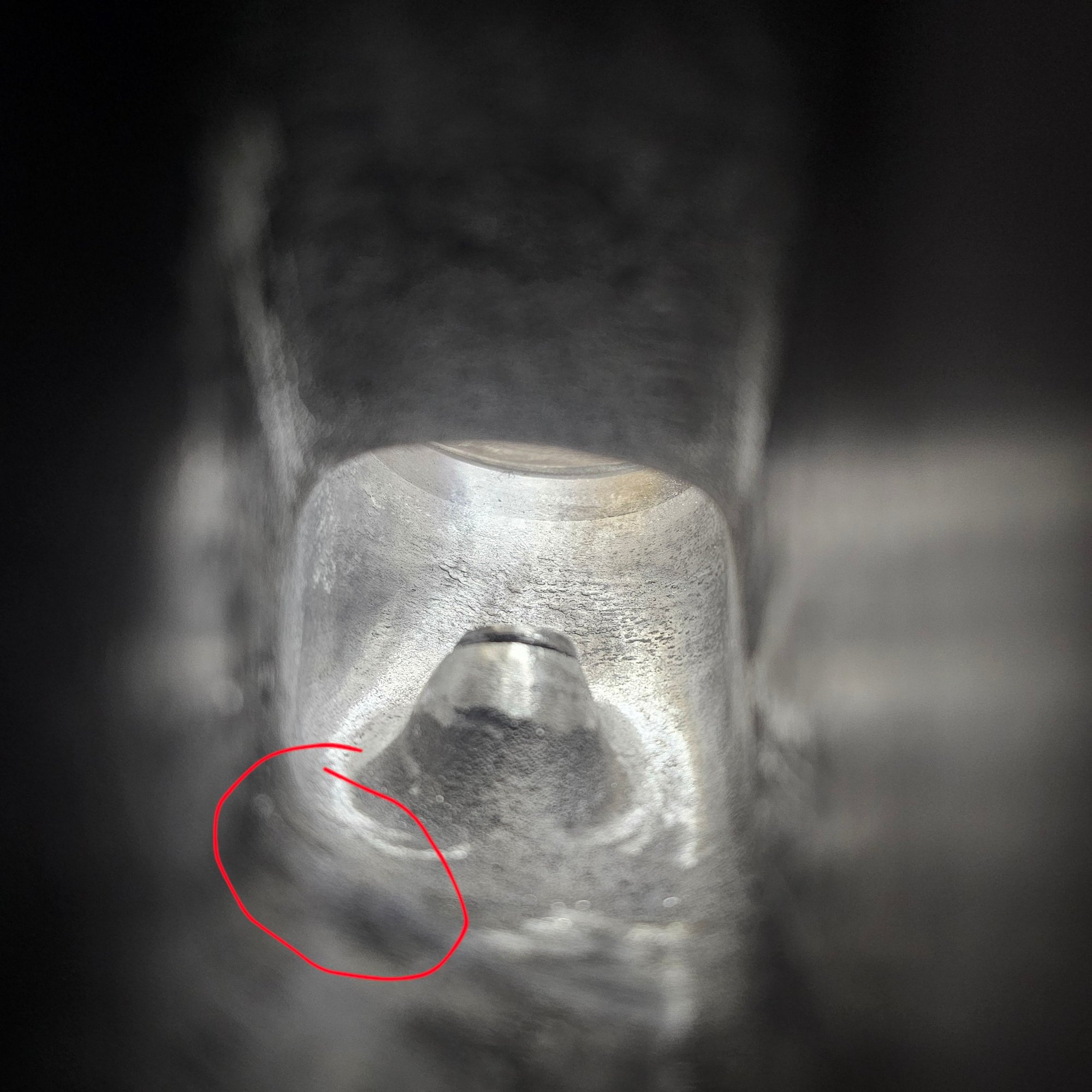 Pic 5: showing the intake deeper inside. Area circled in red is where that curved wall is at its most narrow. Should this area be ground flush with the port floor?