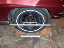 Toe bar held to wheel with magnets