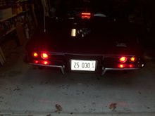 In daylight with garage door open - brakes on
LED infused red lights on outside & LED red bulbs inside with white brake light lenses.