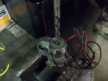 Keep the bit at the bottom of the key hole. I removed the chrome to make it easier to drill.