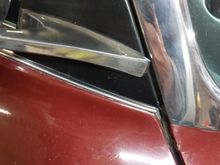 Gap at the windshield trim. Considering a rubber spacer glued to the bracket to prevent movement forward if it comes forward in use.