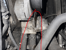 what seems to be a coolant streak on water pump, hose, and other part