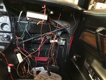 Don’t ask me about all the wires.  If you plug the harness into the radio you will find the holes because there wire is very short.