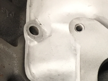 There is a small crack in the manifold coming out of the bolt hole pictured