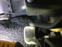 The two bolts that hold the convertible frame have washers on them.  You should try and mark their location befor loosening them.