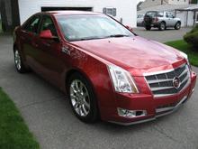This is my wife's 2008 Cadillac CTS-4 in Crystal Red Metallic.  She loves this car!