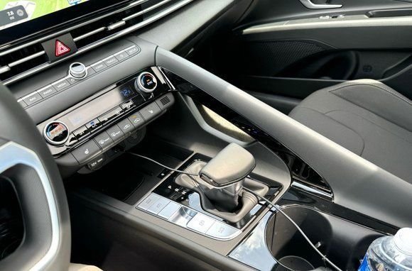 Say what you will about the wall, it was unique.  Unfortunately new setup still looks like a modified hyundai interior. 