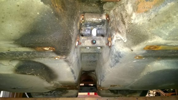Prior to cleaning: View from engine compartment looking back at transmission tunnel.