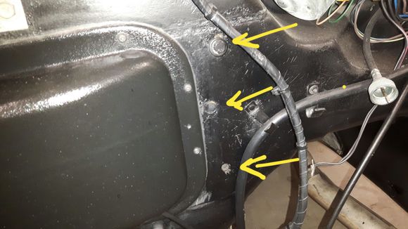 3 holes beside heater cover. Top hole has bolt in it. This car has aftermarket Vintage Air a/c.