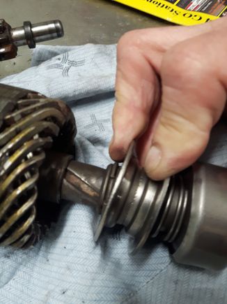 When I pull the collar back on the spring you can see the snap ring. Looks like it might be hard to get that snap ring off with so much spring pressure on the collar.