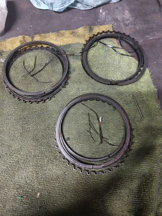 Slithers of metal I dug out of the ring groove of the second compression ring.