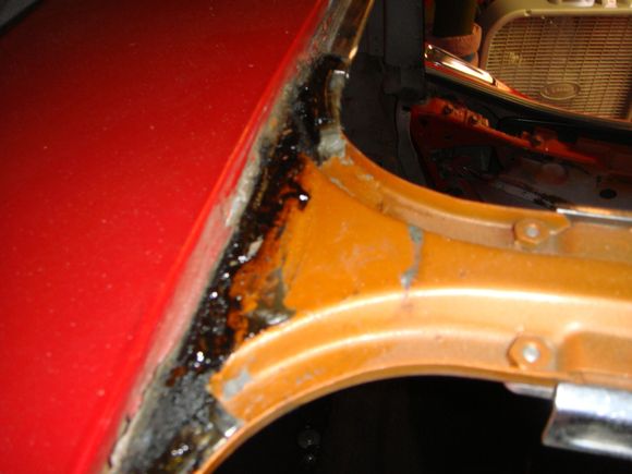 OEM color hiding under never removed stainless trim.