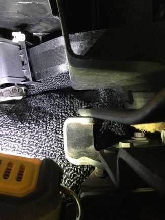The two bolts that hold the convertible frame have washers on them.  You should try and mark their location befor loosening them.