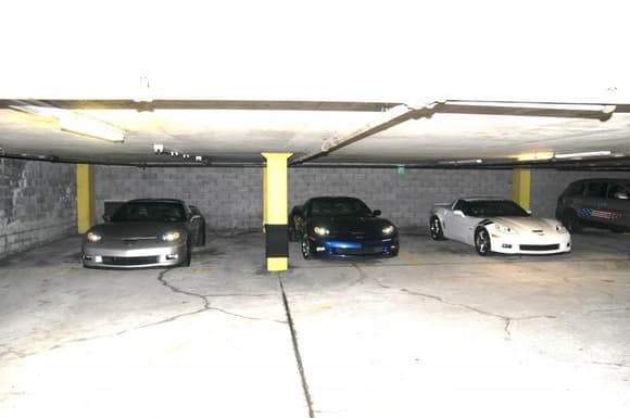 A Monterey Plaza Hotel &amp; Spa parking garage gathering of C6 Z06's, in town for the '08 Laguna Seca ALMS. From the left; Roger's, Benny's, and mine. They're all the same; yet, each is very different.