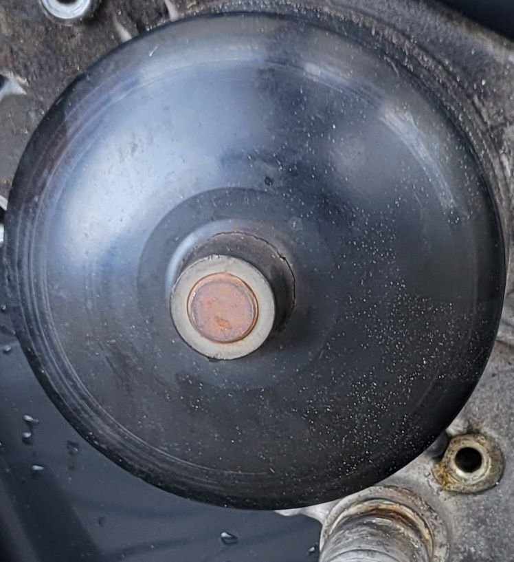 Notice crack around the pulley arbor