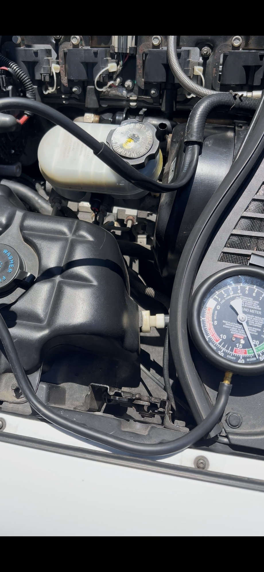 Vacuum gauge hooked up to brake booster vacuum supply line. (Engine is currently at IDLE)