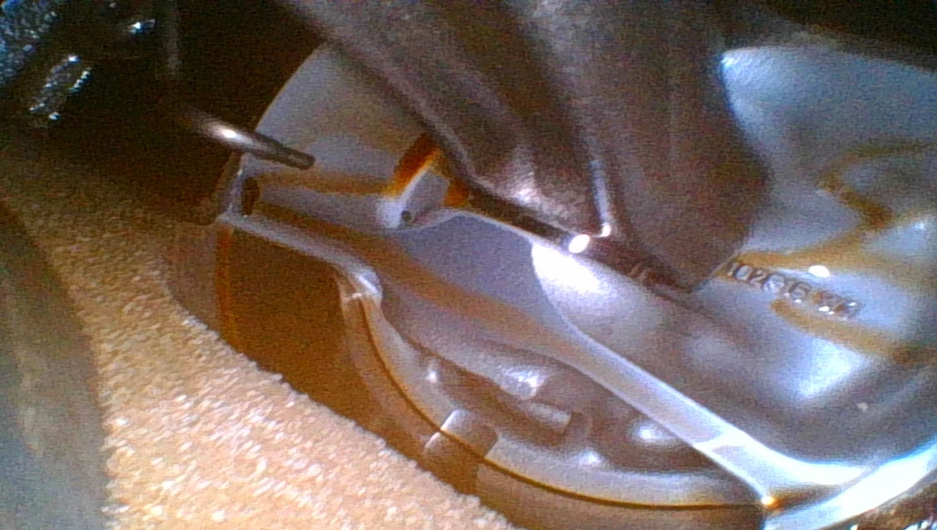 View of the underside of the piston.  