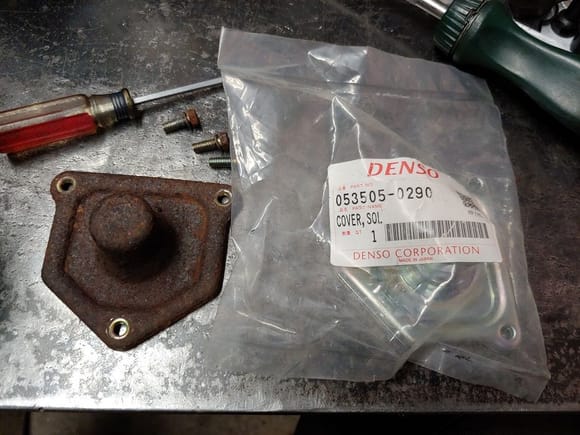 Original solenoid end cap, and new old stock new one.