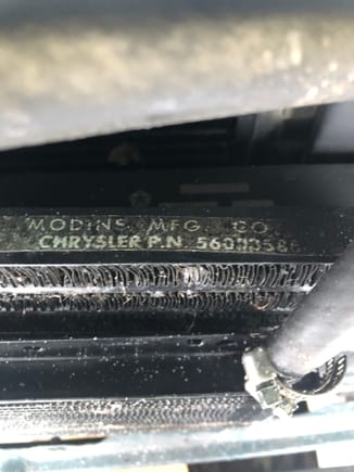 Part number for rad in behind what I'm guessing is the trans-cooler. Looks to read 56033586 but I'm unsure and can't find a similar piece anywhere else.