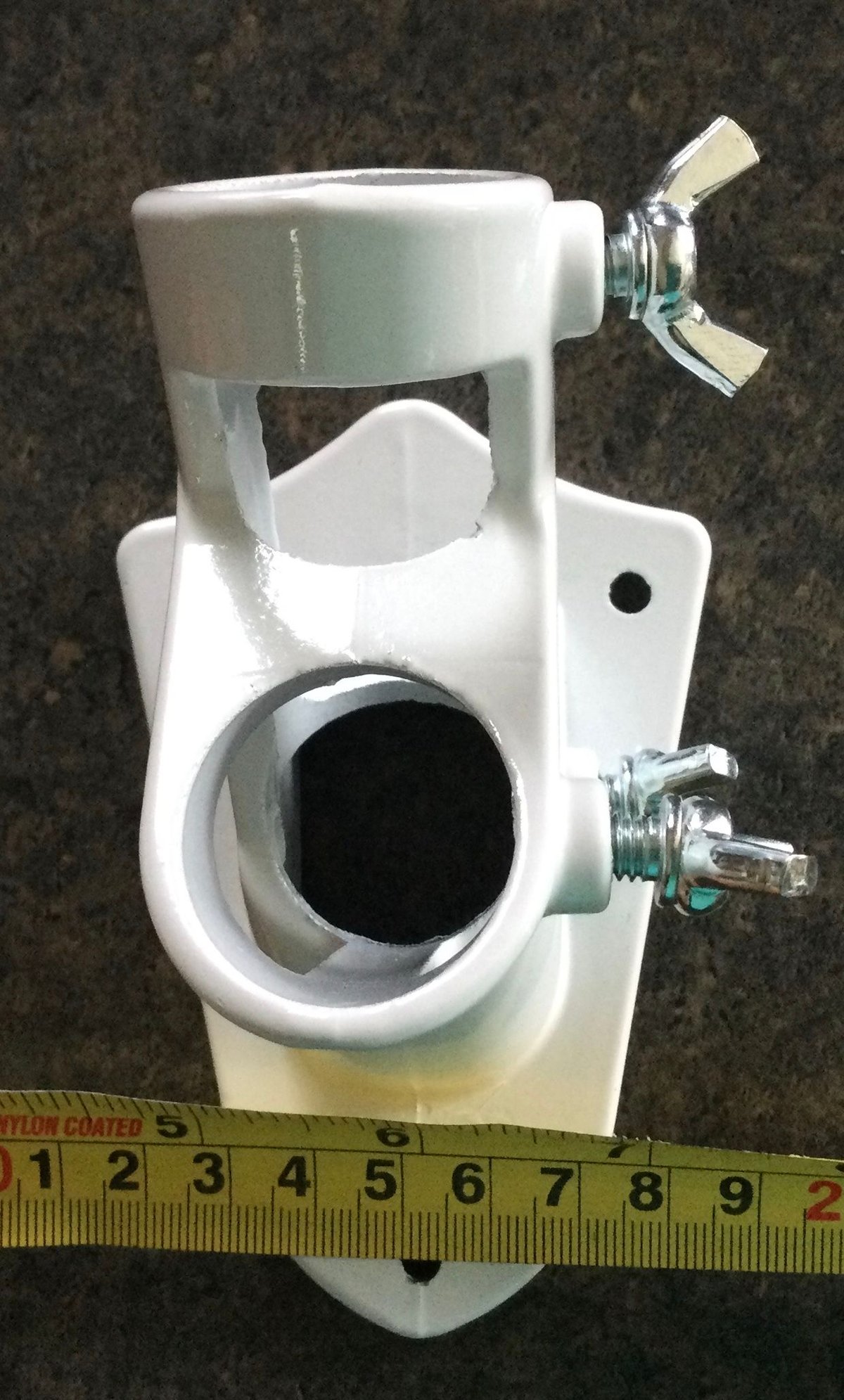 Install 6 foot flagpole to brick on house Community